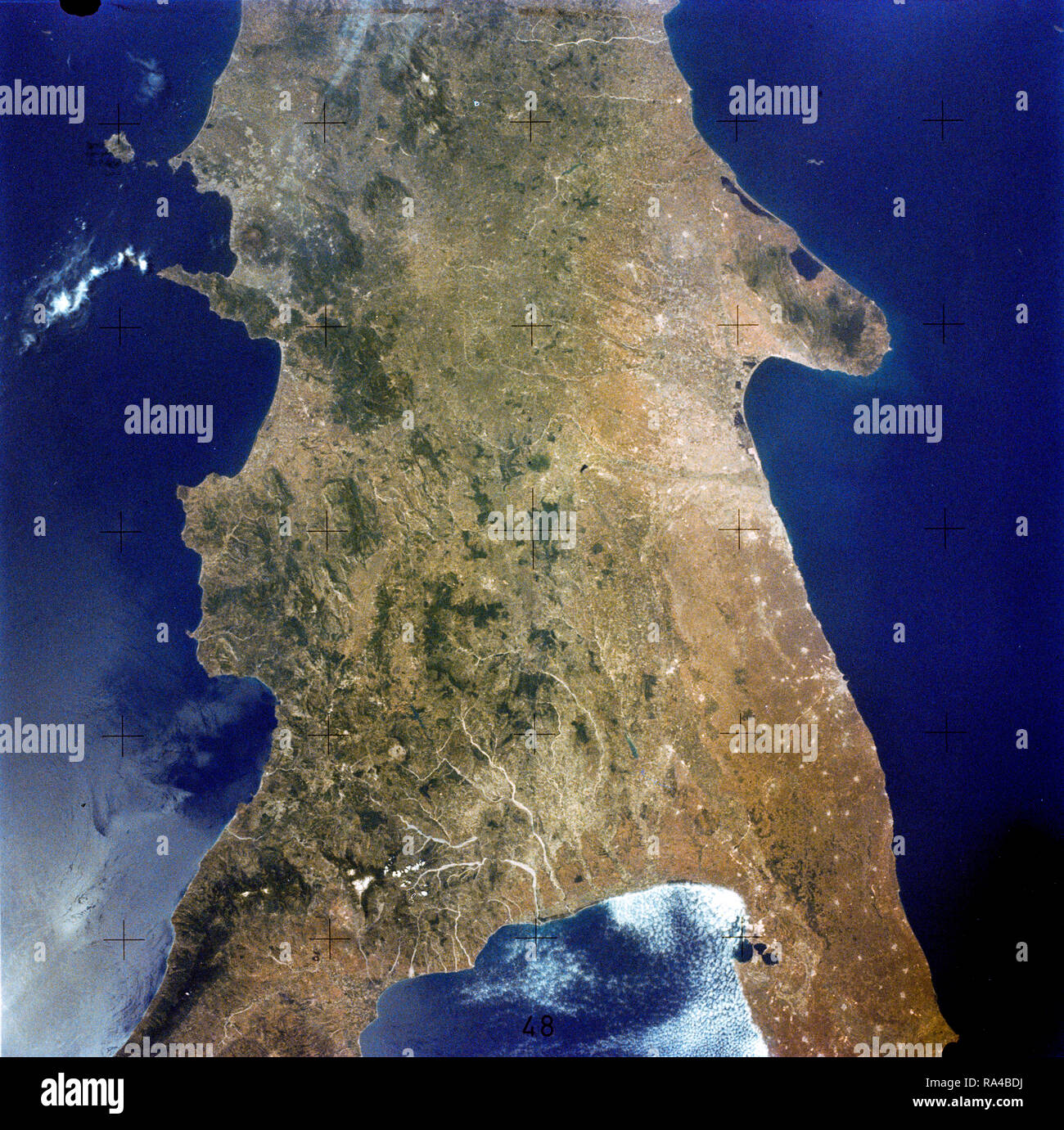 (22 June 1973) --- This rare cloud free view of southern Italy (41.0N, 16.0E) shows almost all of the famous `boot' configuration of the peninsula up to just north of Naples and Mount Vesuvius. The land mass of this historic peninsula contrasts sharply with the sparkling blue waters of the Mediterranean Sea. Stock Photo